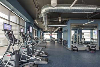High-endurance fitness center with cardio & strength training equipment